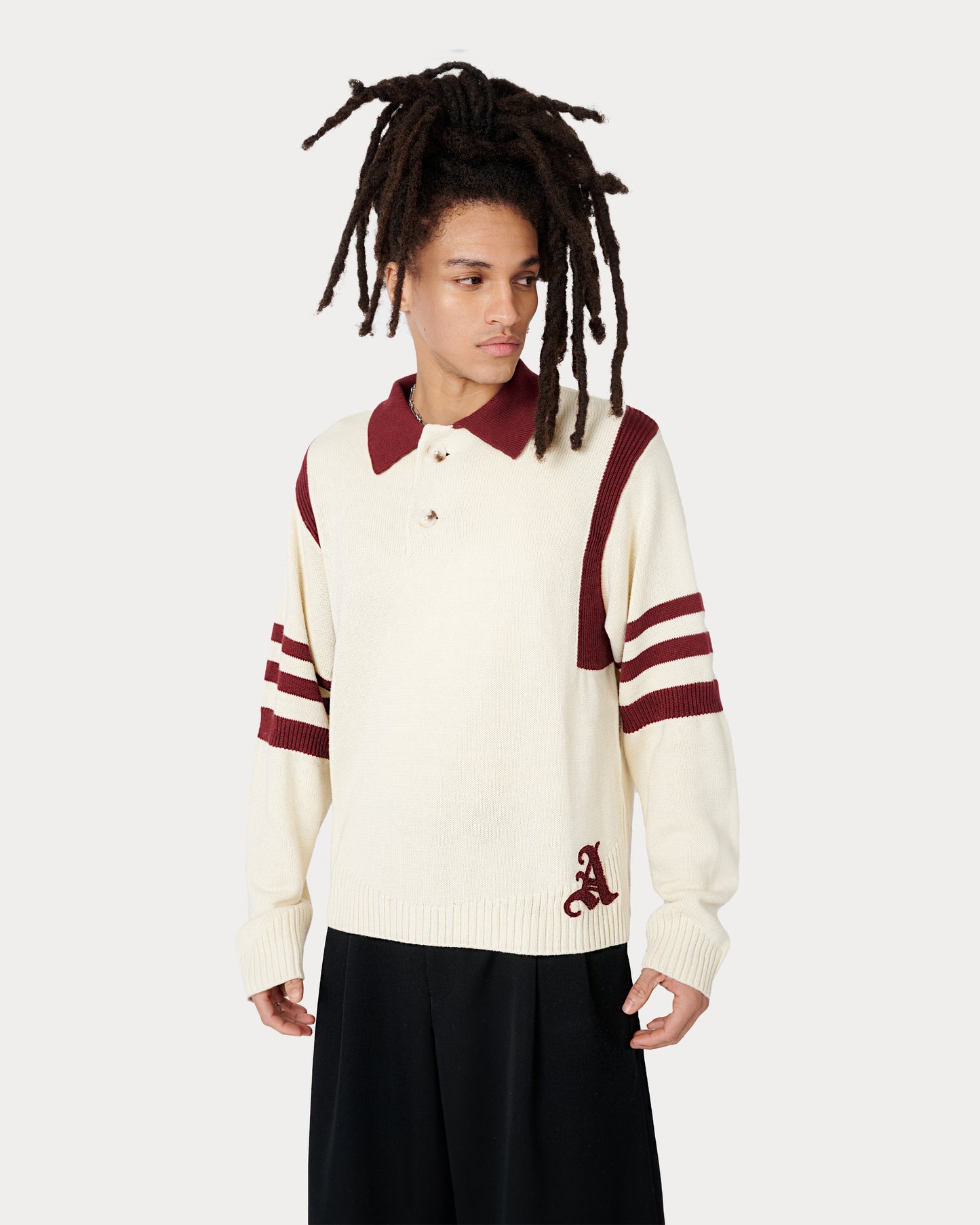 Model is wearing size XL in the Kai Rugby Knit in Cream and Burgundy color