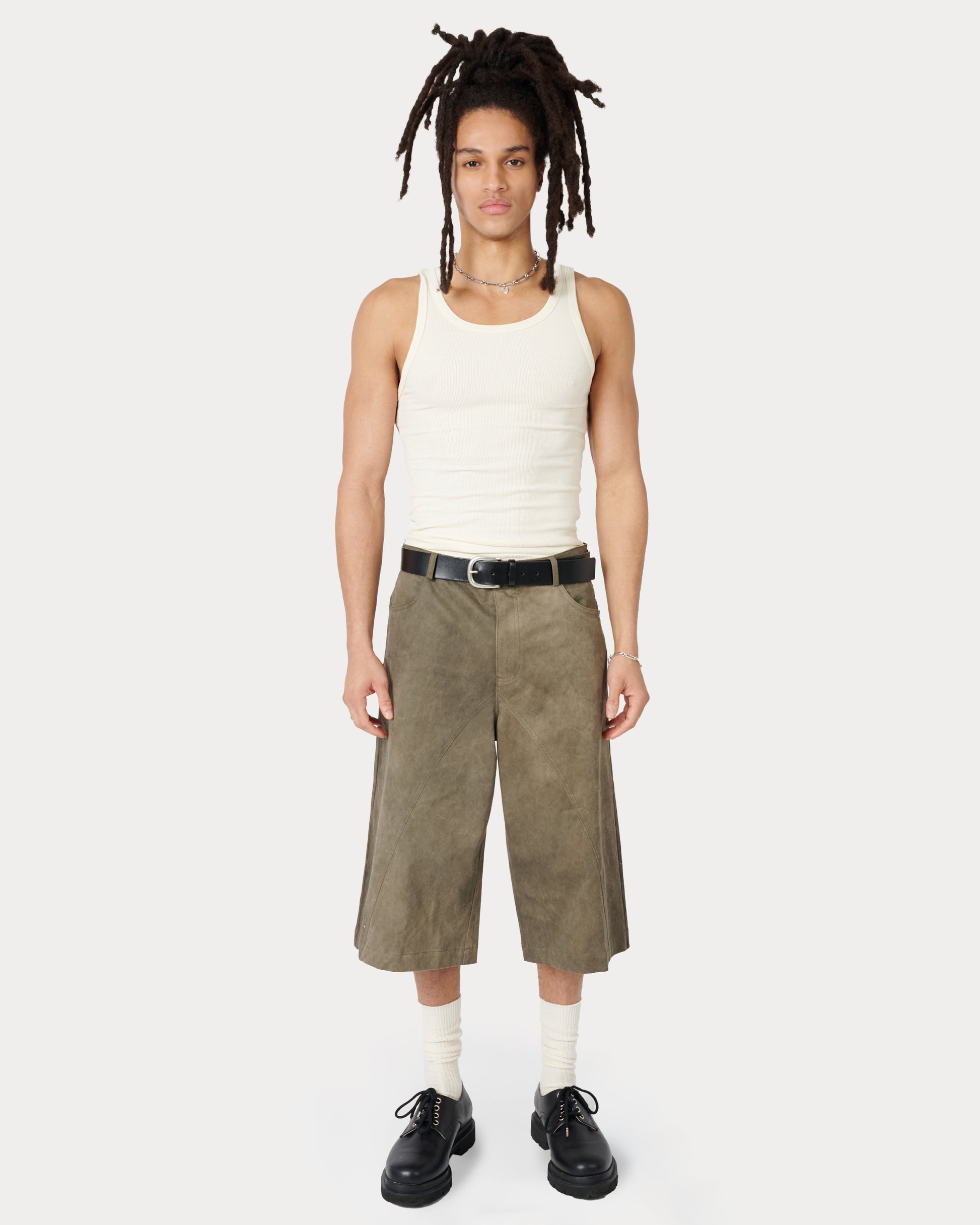 Model is wearing size Medium in Mens Tommi Shorts in Washed Gray color